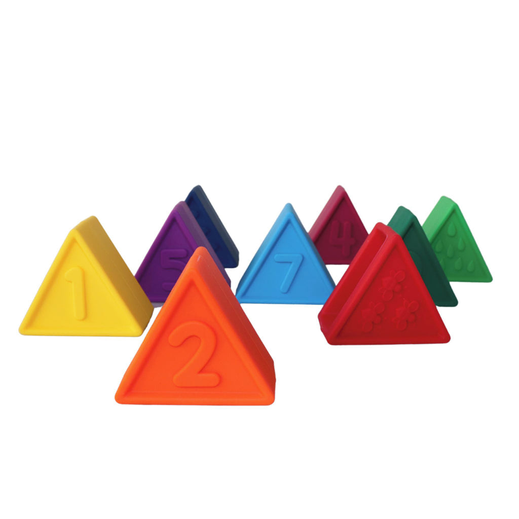 Numbered and textured stacking triangles scattered, showing different angles and learning elements.
