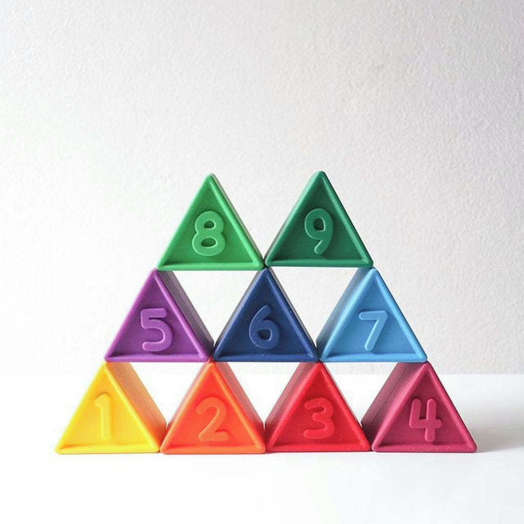 A pyramid of vibrant triangular stacking blocks numbered 1-9, designed for tactile play and learning.