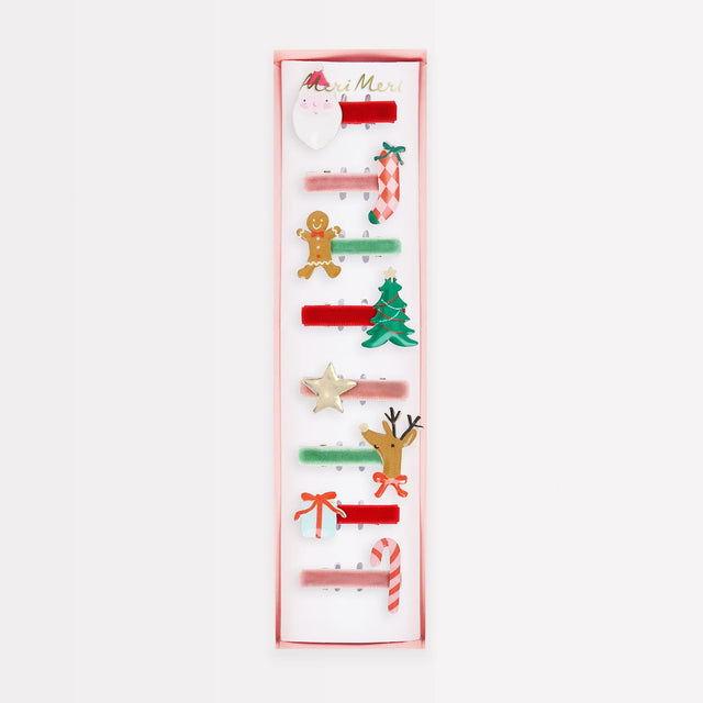Meri Meri Christmas hair clip set packaging featuring velvet ribbons with festive holiday charms.