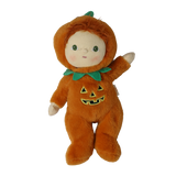 Plush doll in an orange jack-o'-lantern suit raising its left hand with a green leafy collar.