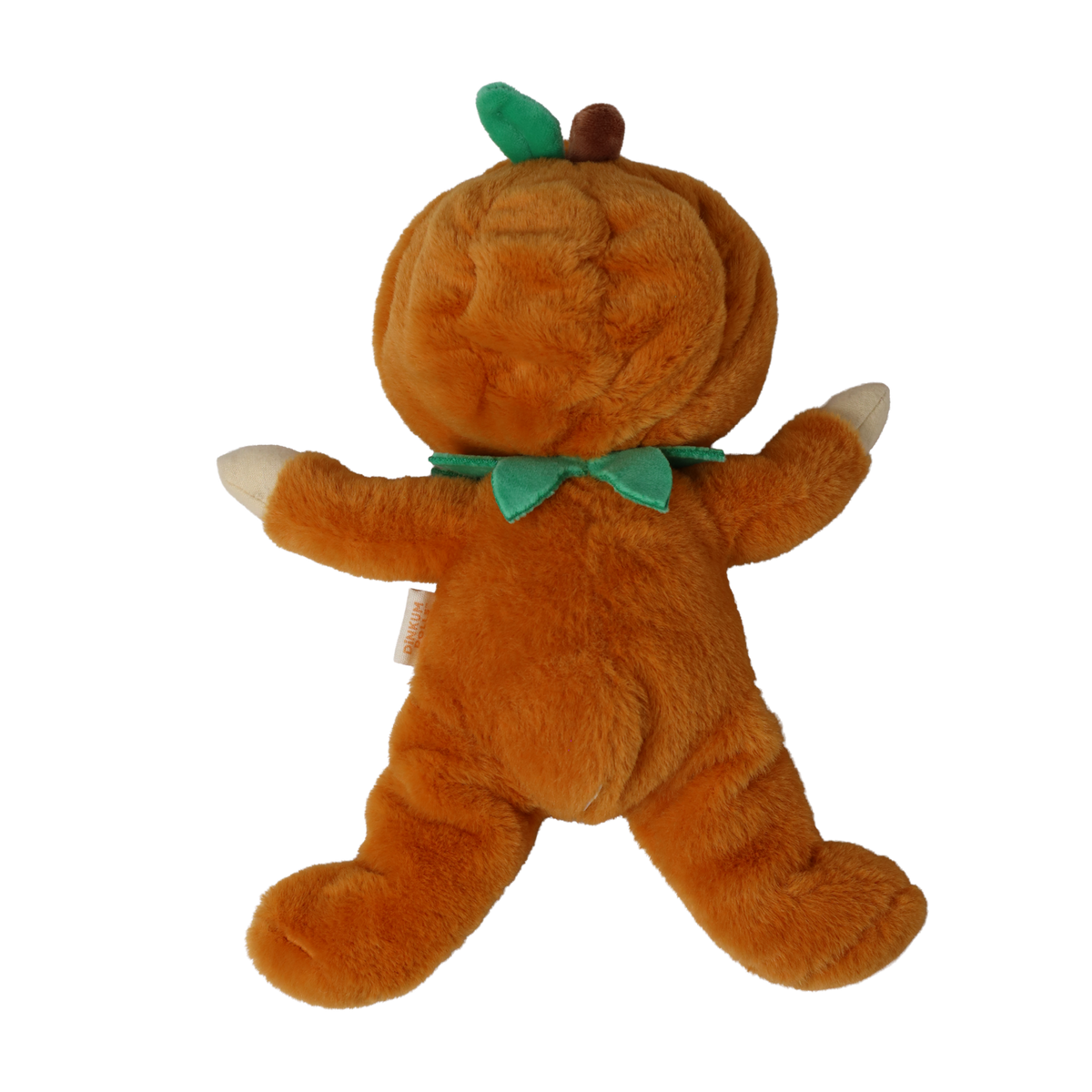 Back view of a plush doll in an orange pumpkin suit with a green leaf and stem on its hood.