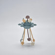Blue silicone baby pull toy with hanging shapes shown standing in a front view.