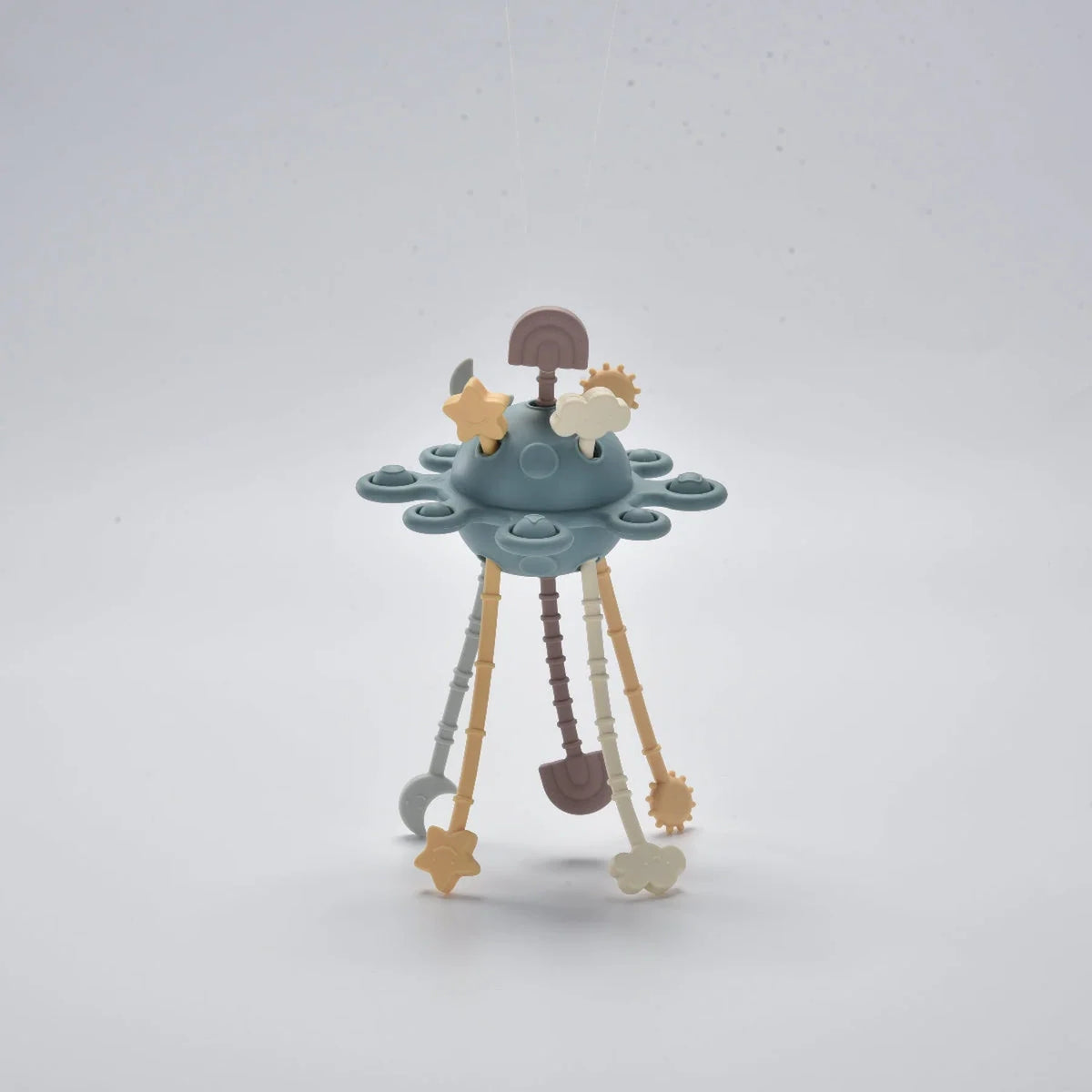 Blue silicone baby pull toy with hanging shapes shown standing in a front view.