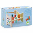 Djeco Junzo Taptap wooden hammering bench toy for toddlers with panda design and colorful pegs.