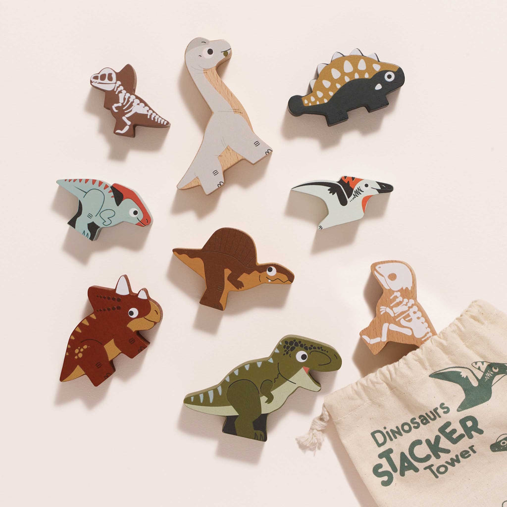 Cloth bag labeled "Dinosaurs Stacker Tower" with colorful wooden dinosaur figurines, featuring playful expressions and varied patterns, evoking fun and creativity.