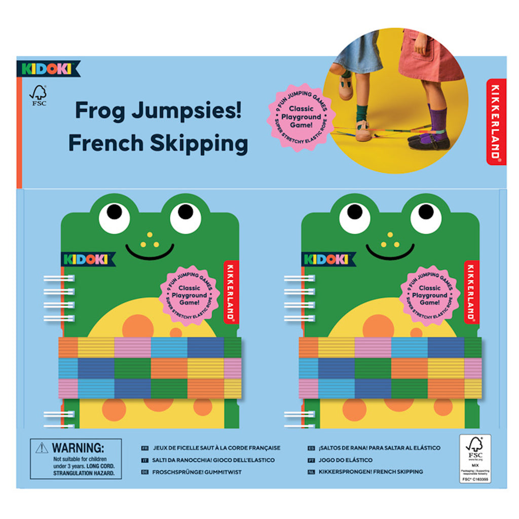 Playful frog-themed packaging for "Frog Jumpsies! French Skipping" by Kidoki and Kikkerland. Features colorful elastic bands and a classic playground vibe.