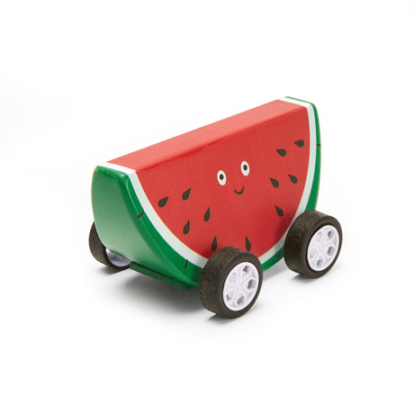 A wooden toy car shaped like a smiling watermelon slice with four wheels. It features a red and green design with painted black seeds, creating a playful and cheerful vibe.