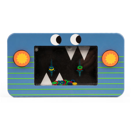 Blue toy resembling a monster with googly eyes, jagged teeth, and colorful rings inside a rectangular frame. Playful and whimsical design.