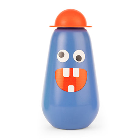 Blue bottle with a playful monster face, including big eyes and a wide-toothed smile. Topped with a round orange cap, conveying a whimsical tone.