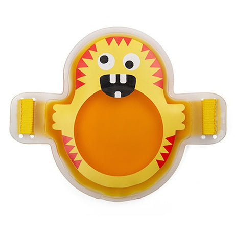 Yellow, monster-shaped children's plate with red zigzag edges and a smiling face with two big teeth. Two yellow straps are attached on the sides. Playful and fun.