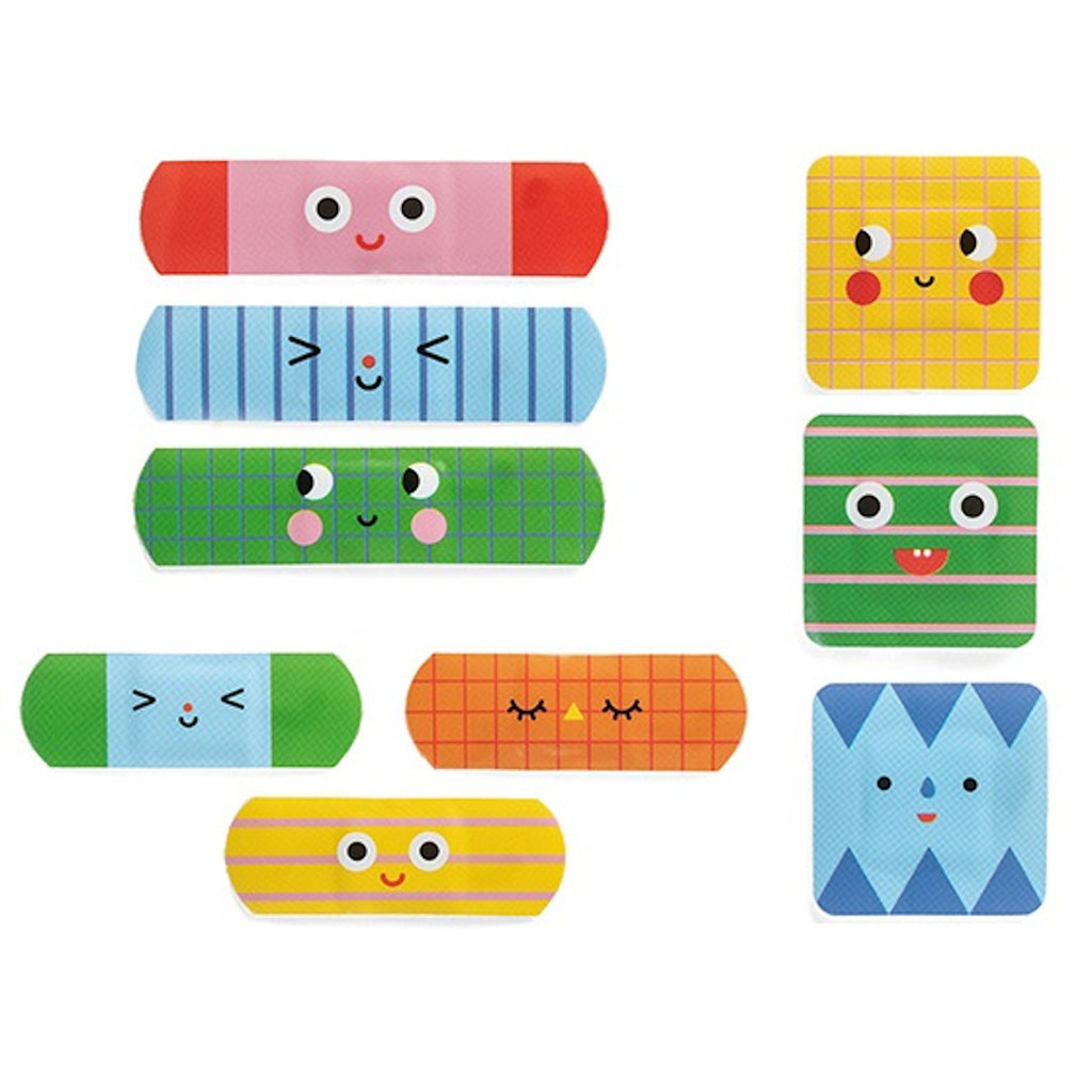 Colorful cartoon band-aids with smiling faces and cute expressions arranged in a playful layout. Designs feature stripes, checks, and bright colors.