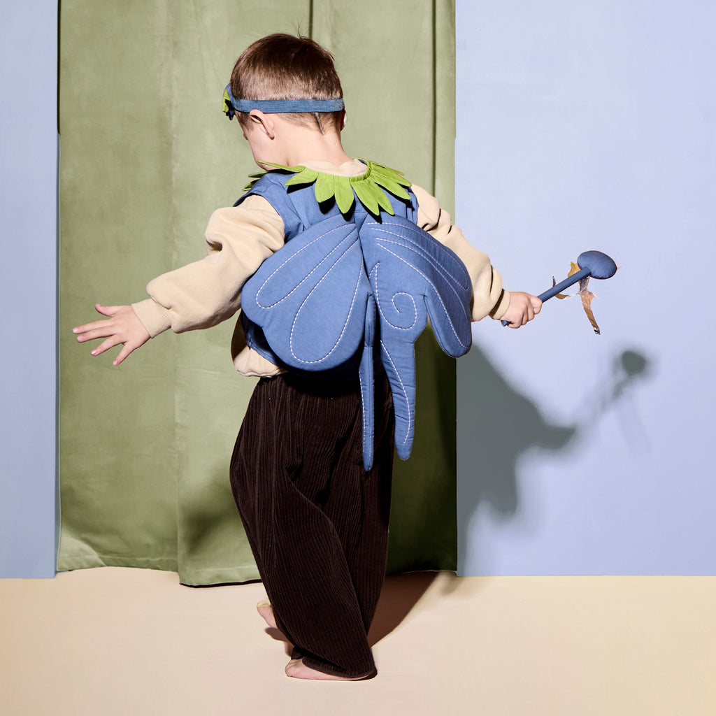 A blue butterfly costume with green accents, featuring wings, a headband, and a wand.