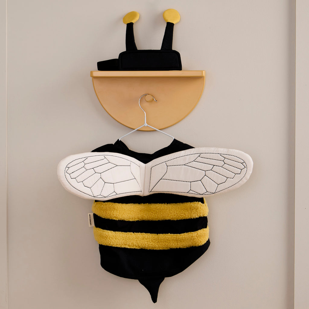 A playful bee costume for pets featuring yellow and black stripes, translucent wings with vein details, and a black headband with yellow pom antennas.