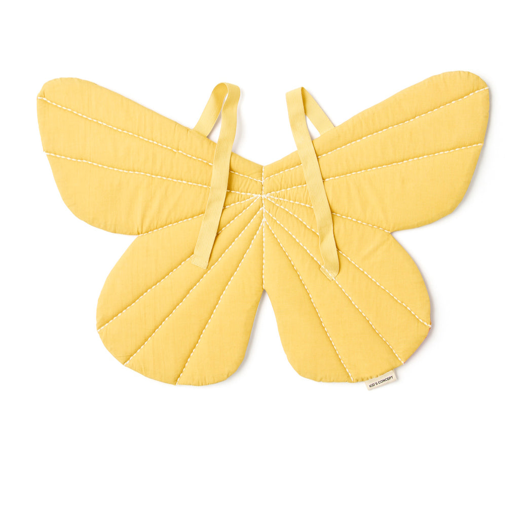 Yellow fabric butterfly wings costume with quilted stitching and two attached yellow straps for wearing. The design is simple and cheerful.