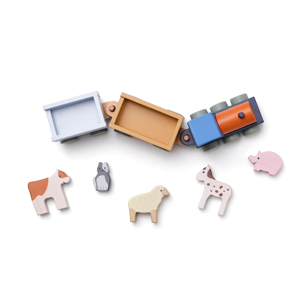 Wooden toy train with colorful carriages surrounded by animal figures, including a cow, rabbit, sheep, giraffe, and pig, on a white background.