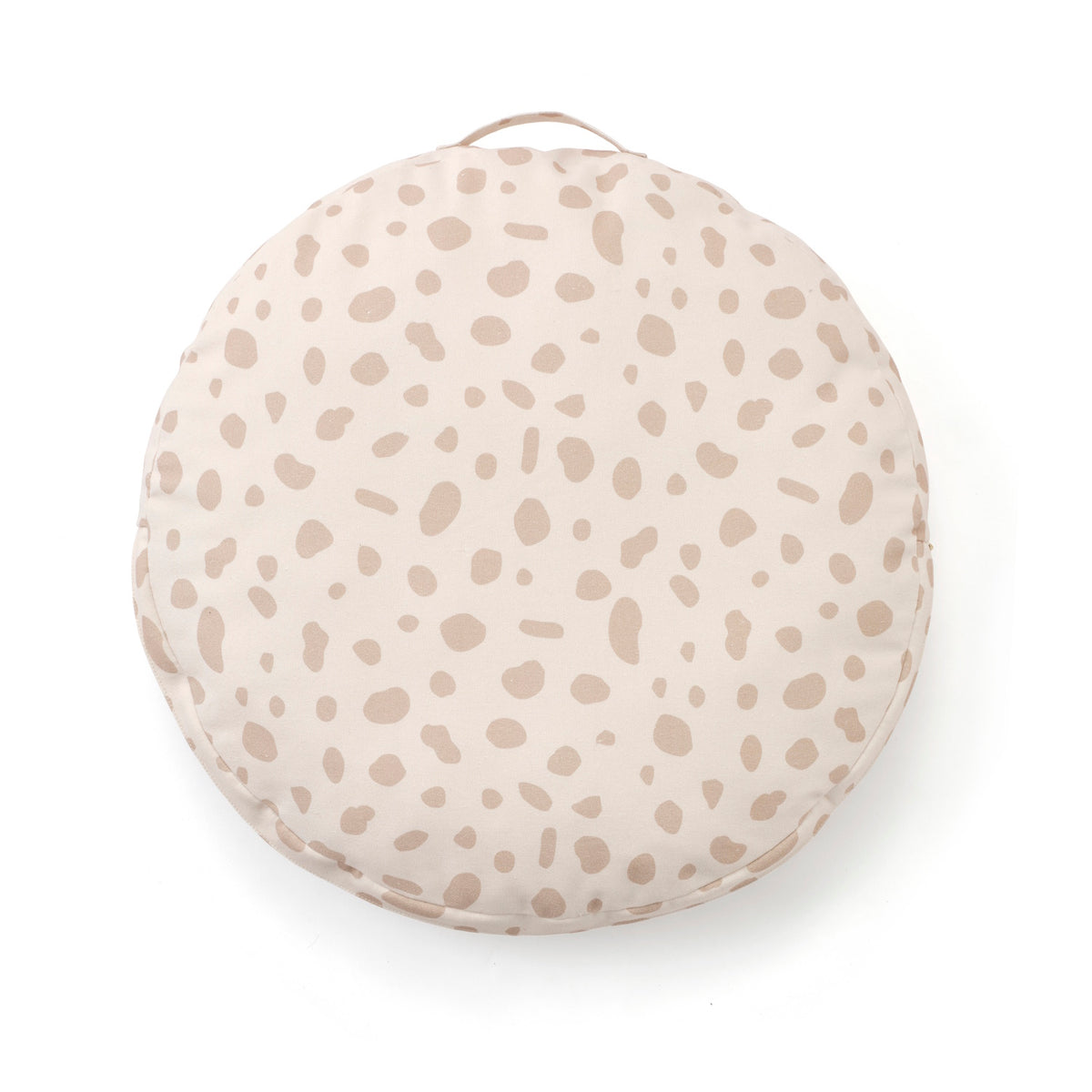 Round beige floor cushion with a subtle spotted pattern and carrying handle on a white background.