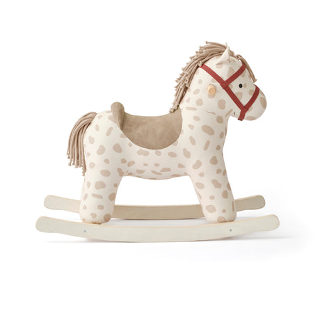 Kids Concept Dotty beige spotted plush rocking horse toy with wooden runners and a brown saddle.