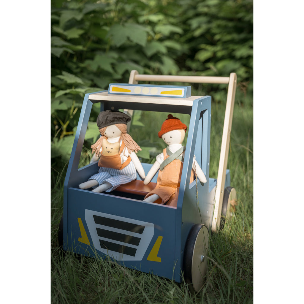 Wooden toy car with a blue body and natural wood accents, featuring four wheels and a handle at the back for pushing. The design is simple and playful.