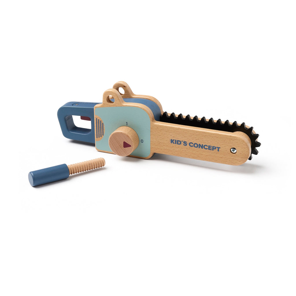 Wooden toy chainsaw with blue handle and details, featuring a rotating knob and black ridged edge. "Kid’s Concept" is printed on the side.