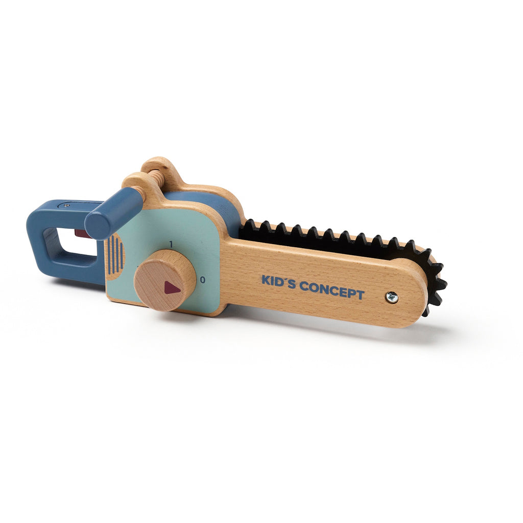 Wooden toy chainsaw with blue handle and details, featuring a rotating knob and black ridged edge. "Kid’s Concept" is printed on the side.