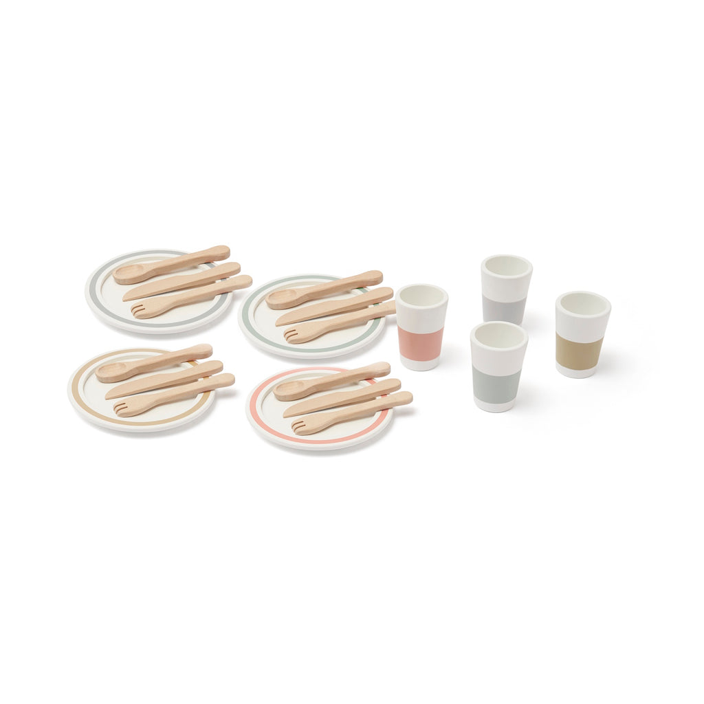 Toy dining set with wooden forks, knives, and spoons on two plates. Four pastel-toned cups complement the minimalist, playful design, on a white background.