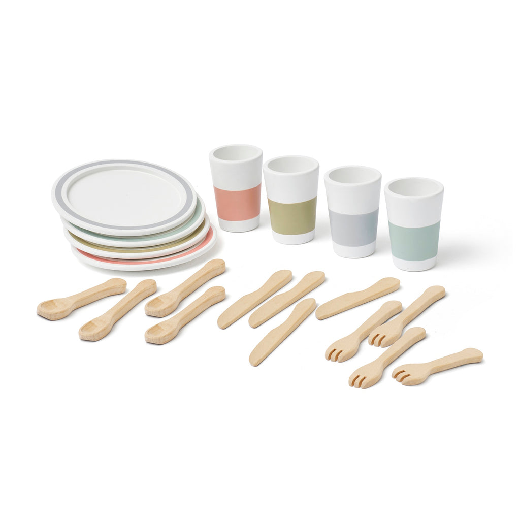 Toy dining set with wooden forks, knives, and spoons on two plates. Four pastel-toned cups complement the minimalist, playful design, on a white background.