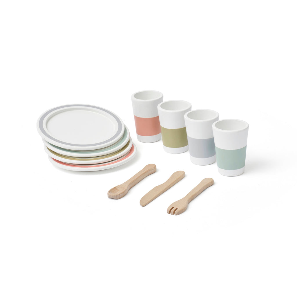 Toy dining set with wooden forks, knives, and spoons on two plates. Four pastel-toned cups complement the minimalist, playful design, on a white background.