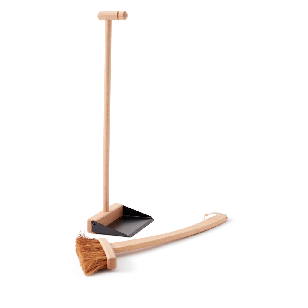 Wooden-handled dustpan and matching broom set on a white background. The dustpan is black, conveying a minimalist, modern design.