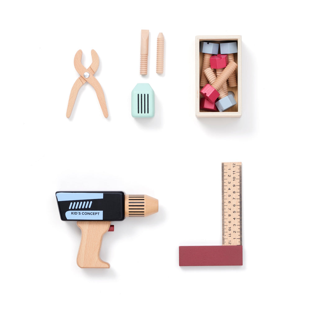 Toy tool set on white background. Includes wooden pliers, toy drill, screws, bolts, ruler, and box with colorful blocks, evoking playful creativity.