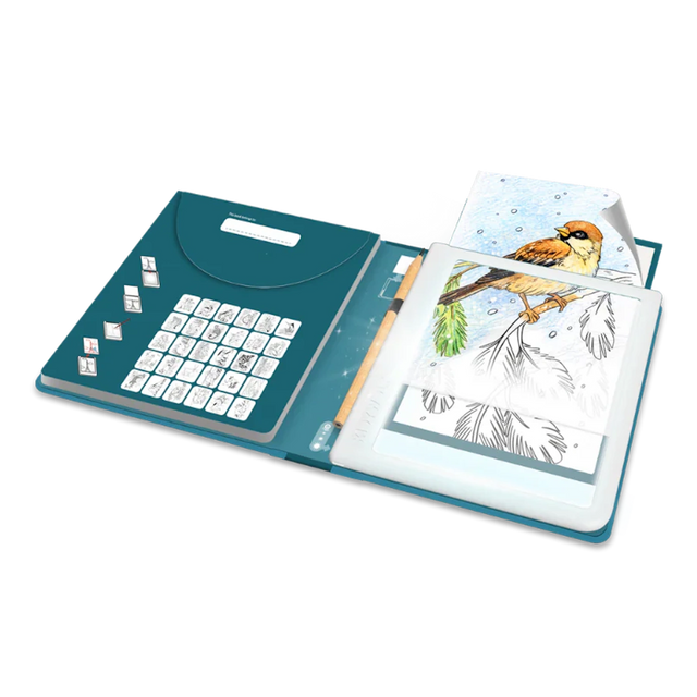 An open drawing pad kit with a light-up tracing tablet showing a bird drawing and a pencil.