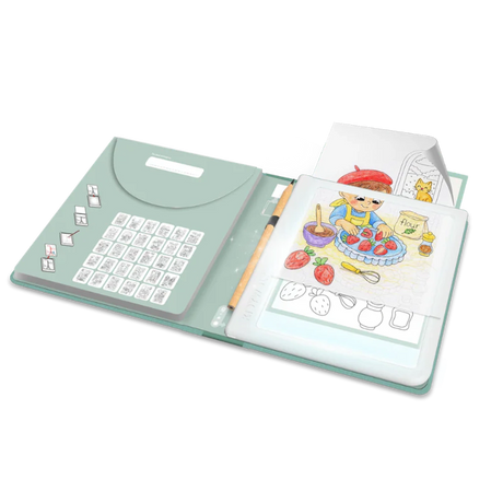 An open mint green drawing kit with an illuminated tracing pad, pencil, and a colorful drawing of a child.