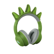 Green headphones with soft, gray ear cushions on a white background, featuring playful green dinosaur spikes on the headband, conveying a fun and quirky vibe.
