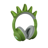 Green headphones with soft, gray ear cushions on a white background, featuring playful green dinosaur spikes on the headband, conveying a fun and quirky vibe.