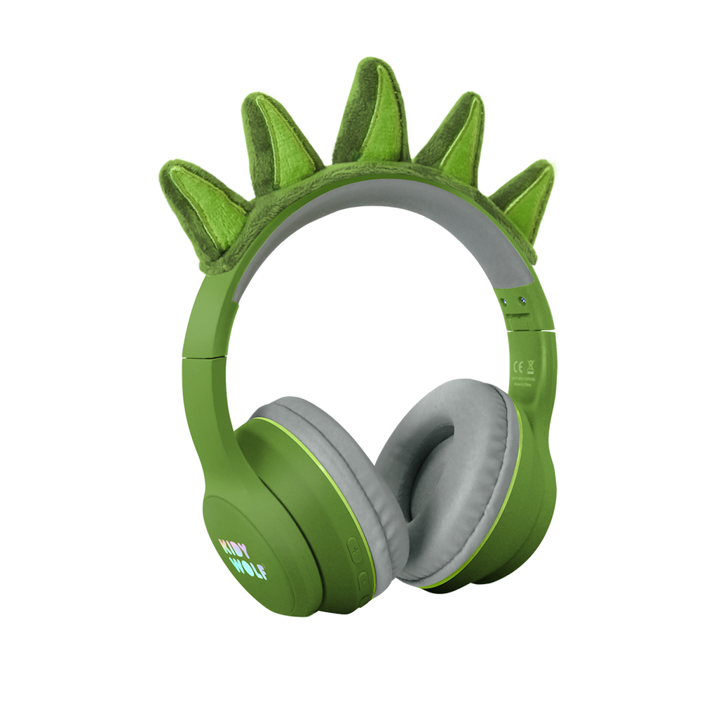 Green headphones with soft, gray ear cushions on a white background, featuring playful green dinosaur spikes on the headband, conveying a fun and quirky vibe.
