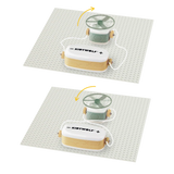 Two diagrams showing a Kidywolf toy circuit base with a battery pack and a fan spinning in opposite directions.