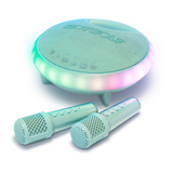 Round karaoke device with glowing edges in pastel colors, accompanied by two microphones. The setup exudes a fun and inviting vibe, ideal for parties.