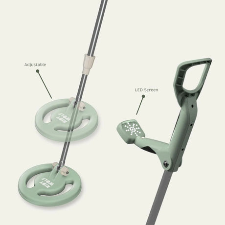 Diagram showing parts of a green toy metal detector, highlighting its adjustable stem and LED screen.