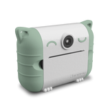 Cute camera with a cat design features mint-green accents and cat-ear details on a glossy white body. It conveys playfulness and whimsy.