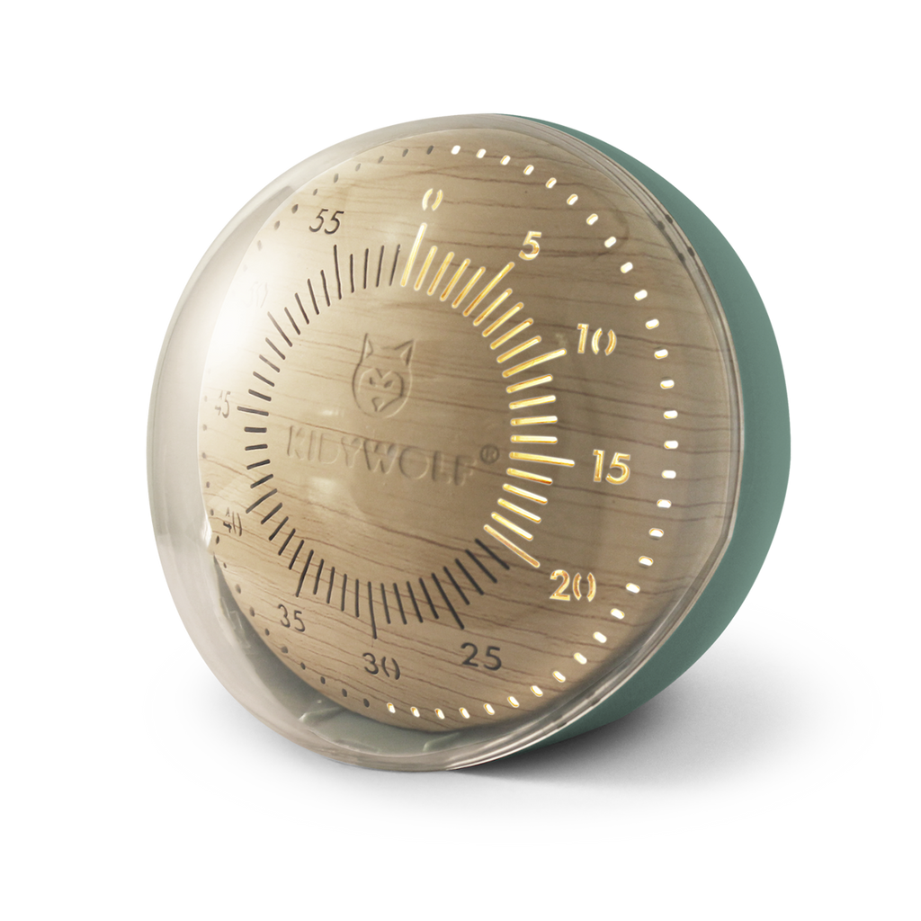A modern kitchen timer with a wooden face under a clear dome, displaying numbers in a circle with a wolf logo. The timer conveys a sleek, contemporary feel.