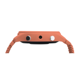 Side profile of a coral-colored smartwatch showing two buttons and a small sensor on the case.