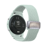 Back of a mint green Kidywolf smartwatch showing the sensors and a woven elastic strap with a metal clasp.