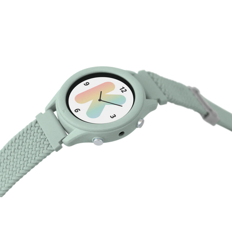 A light green smartwatch with a woven strap and a colorful letter K on the watch face.
