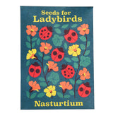 Floral packet for Nasturtium seeds for ladybirds with red ladybugs and orange flowers on a dark teal background.