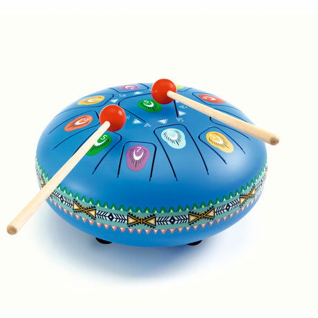 Blue steel tongue drum for kids with colorful numbered notes and two wooden mallets on white background.