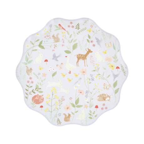 Scalloped paper plate with a watercolor illustration of woodland animals, birds, and wildflowers.