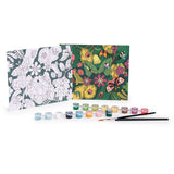 Coloring kit with a nature theme: one black-and-white floral canvas and one colored. Includes paints and two brushes. Vivid and creative atmosphere.