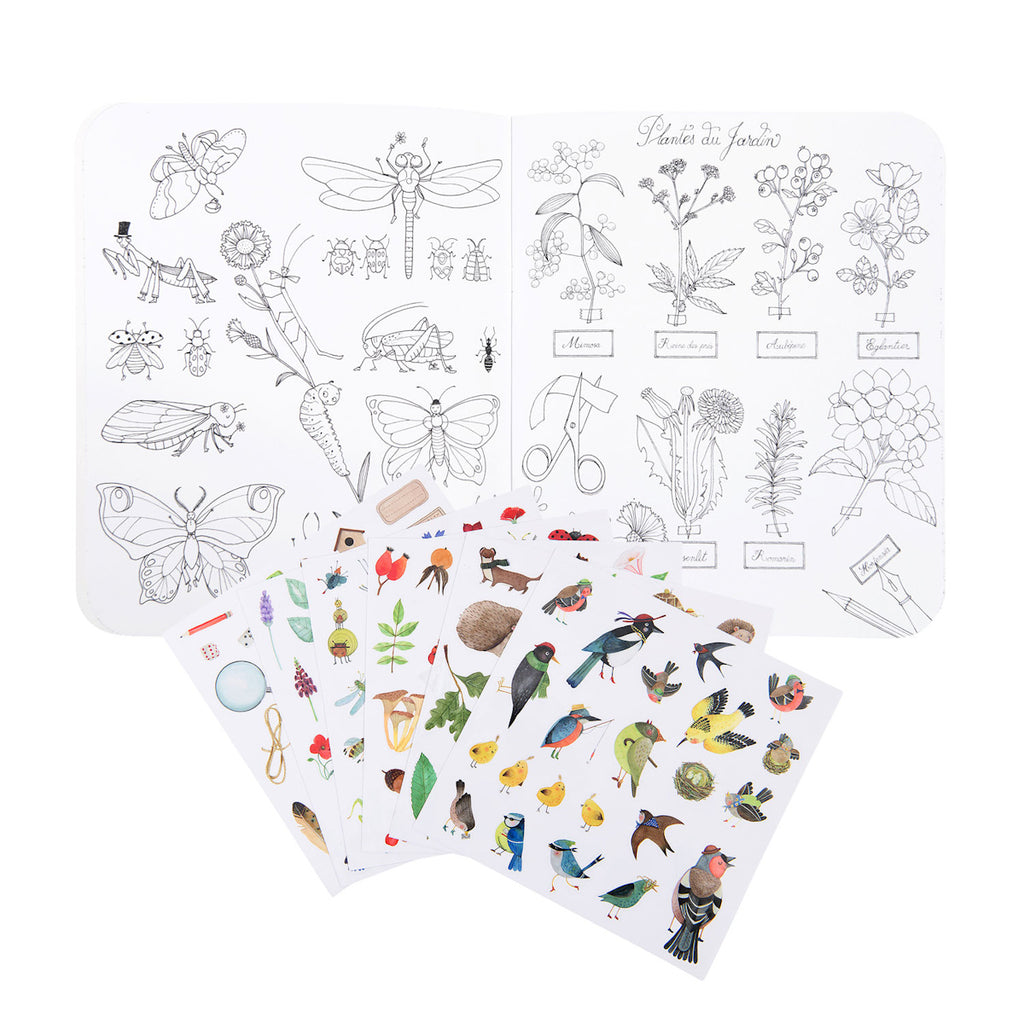Open coloring book features detailed insect and plant illustrations. Below, vibrant stickers of birds, plants, and insects add color. Creative tone.
