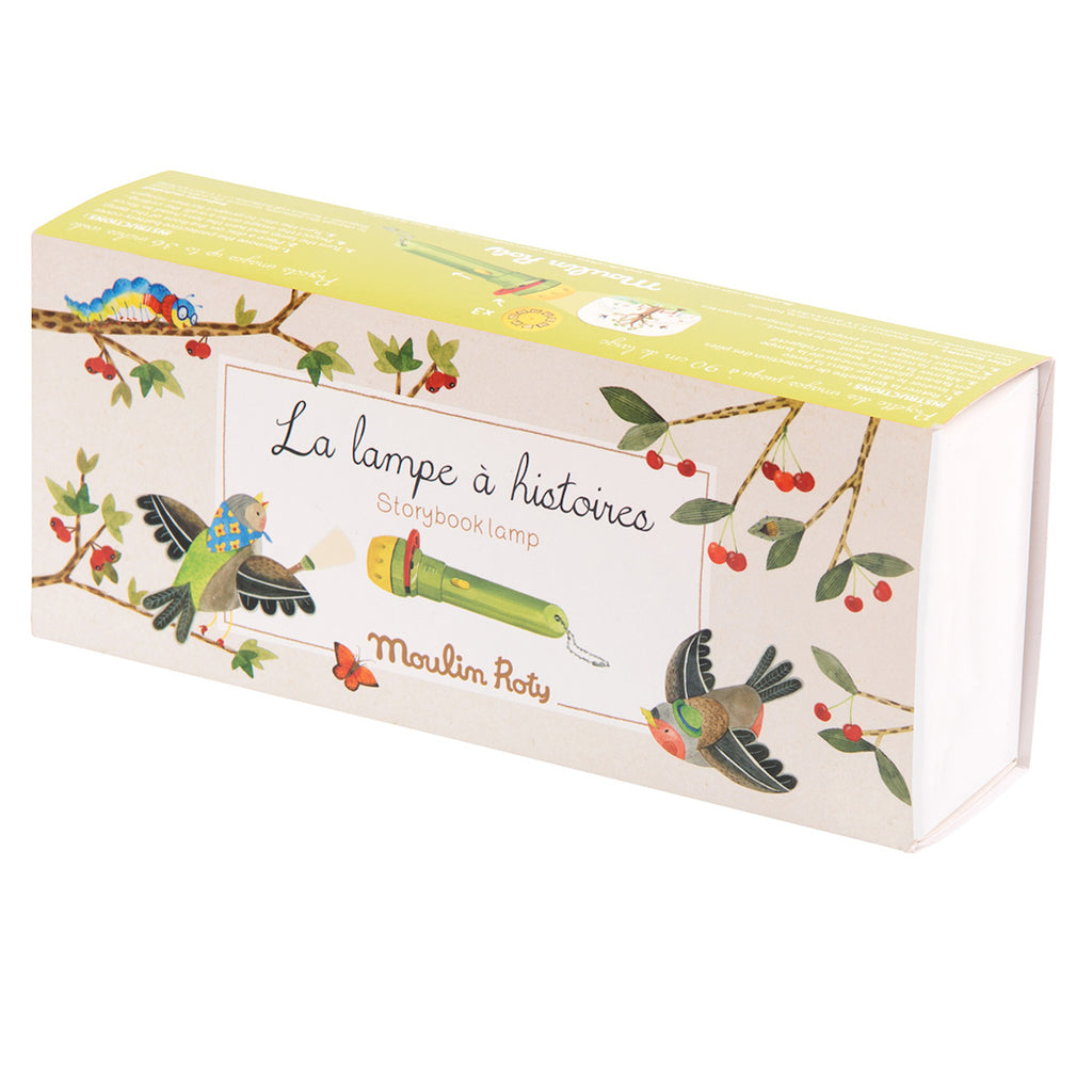 Box for "La Lampe à Histoires" storybook lamp by Moulin Roty. Features colorful birds and branches with red berries, creating a whimsical, playful tone.