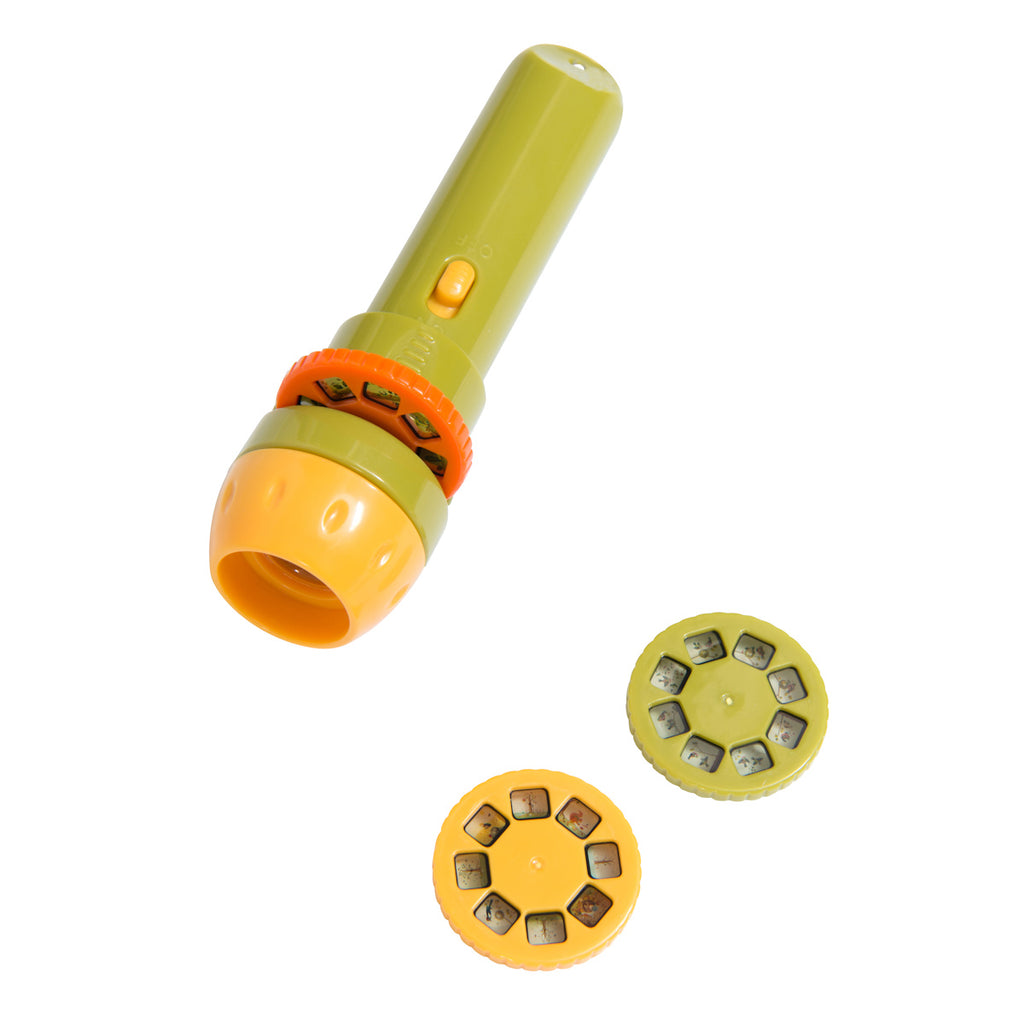 An olive green and orange children's flashlight sits beside three colored discs with tiny illustrated images. The mood is playful and educational.