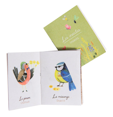 Moulin Roty Le Jardin du Moulin storybook torch birds booklet open to chaffinch and blue tit illustrated pages.
